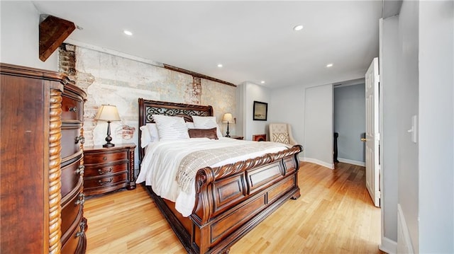 bedroom with light hardwood / wood-style flooring