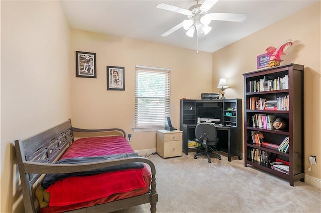 bedroom with light carpet and ceiling fan