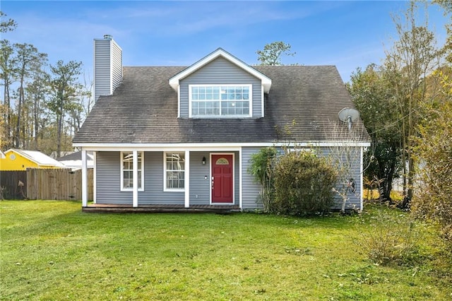 cape cod-style house featuring a porch and a front yard