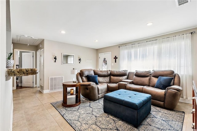 living room with light tile patterned floors