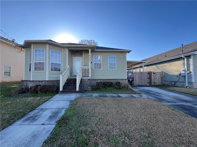 bungalow-style home with a carport