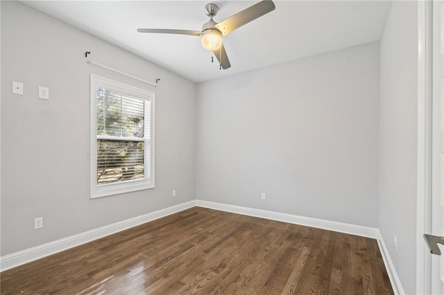 unfurnished room featuring ceiling fan and dark hardwood / wood-style flooring