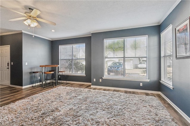 interior space with dark hardwood / wood-style floors and a textured ceiling