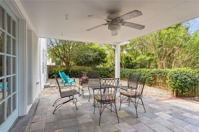 view of patio featuring ceiling fan