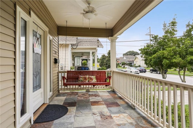 view of patio / terrace featuring ceiling fan and a porch