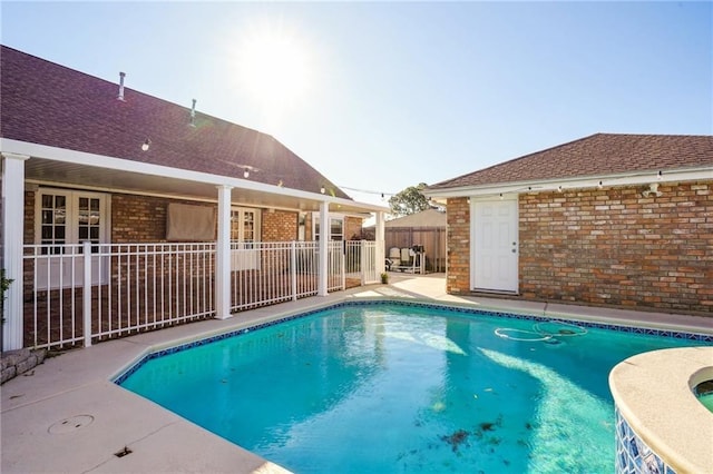 view of pool featuring a patio