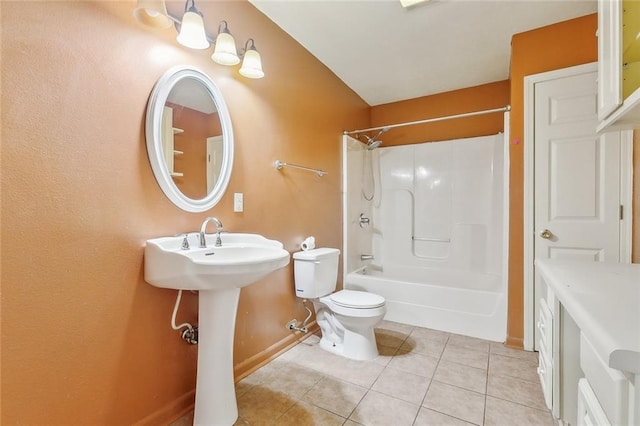 full bathroom featuring tile patterned floors, toilet, sink, and shower / bathing tub combination