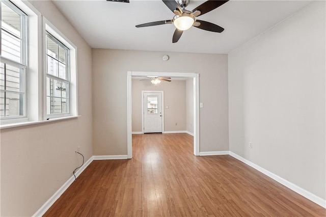 spare room featuring light hardwood / wood-style flooring