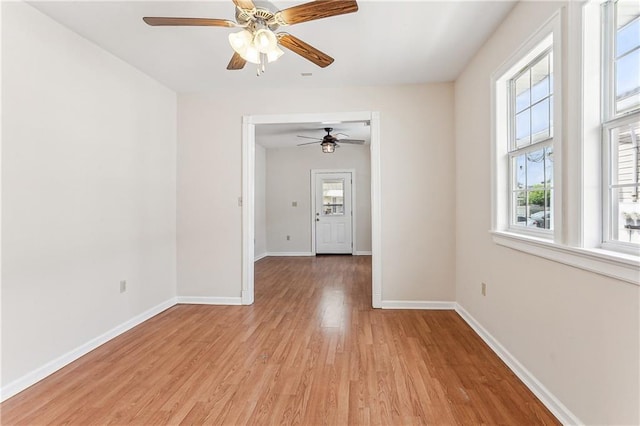 spare room featuring light wood-type flooring