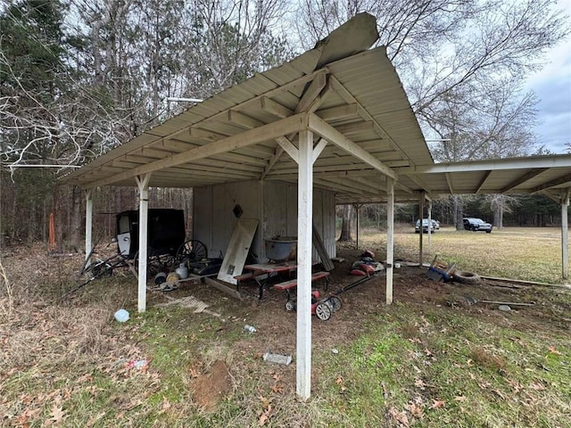 exterior space with a carport