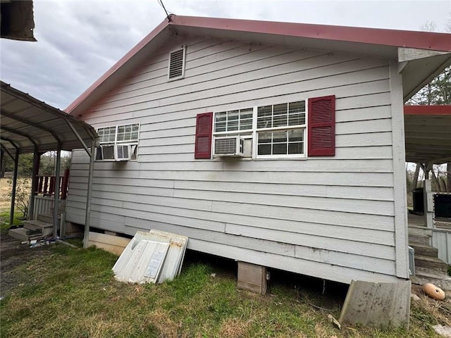 view of property exterior with a carport