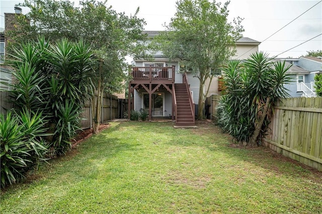 view of yard featuring a wooden deck