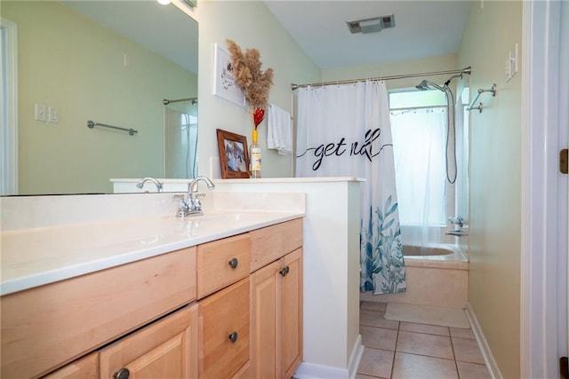 bathroom with vanity, shower / tub combo with curtain, and tile patterned floors