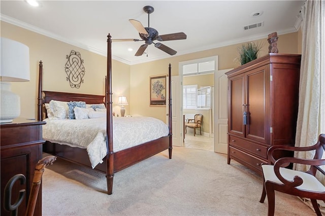 bedroom with ceiling fan, ornamental molding, and light colored carpet