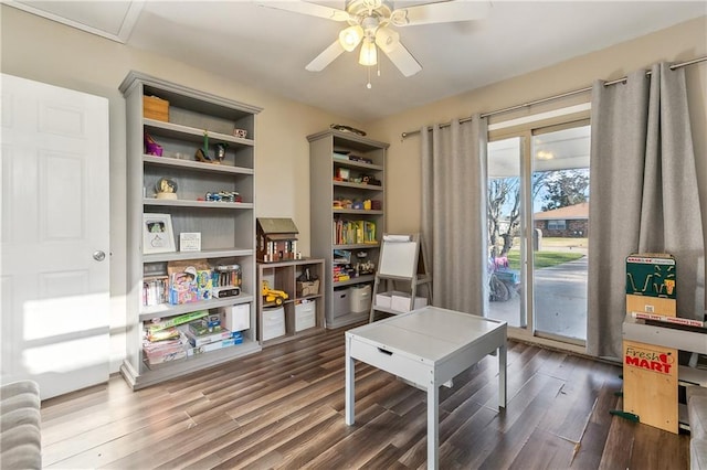 rec room featuring wood-type flooring and ceiling fan