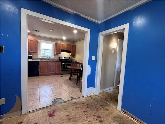 kitchen with crown molding, sink, stainless steel range, and black dishwasher