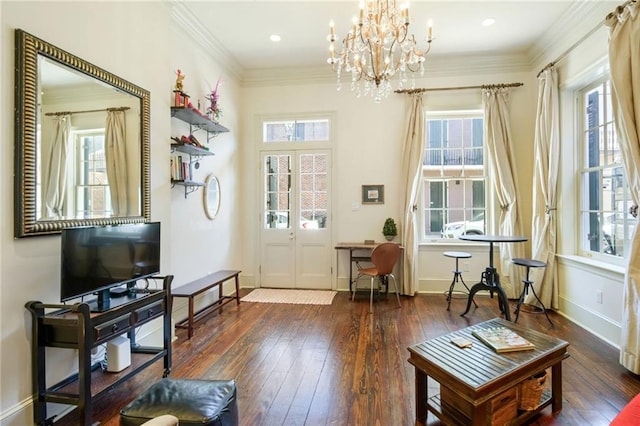 interior space with ornamental molding and dark hardwood / wood-style flooring