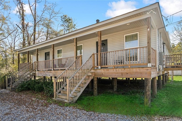 single story home with covered porch