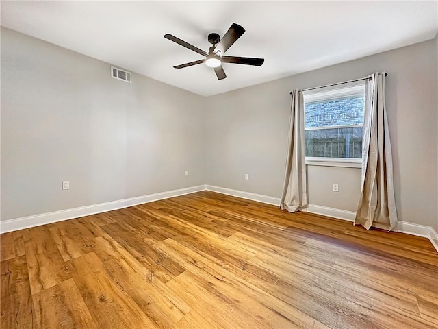 unfurnished room featuring ceiling fan and light hardwood / wood-style floors