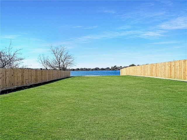 view of yard featuring a water view