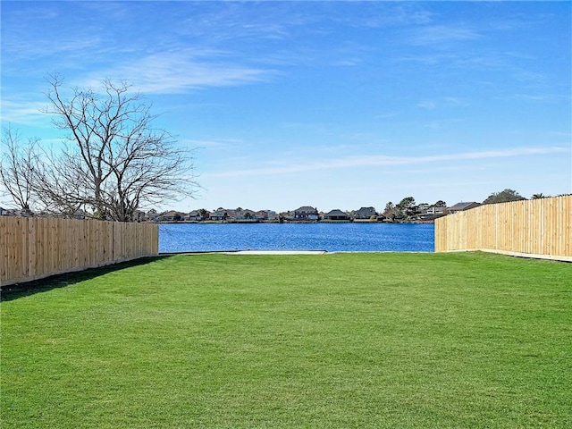 view of yard featuring a water view