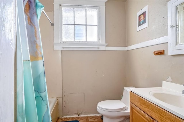 full bathroom featuring parquet floors, vanity, toilet, and shower / bath combination with curtain