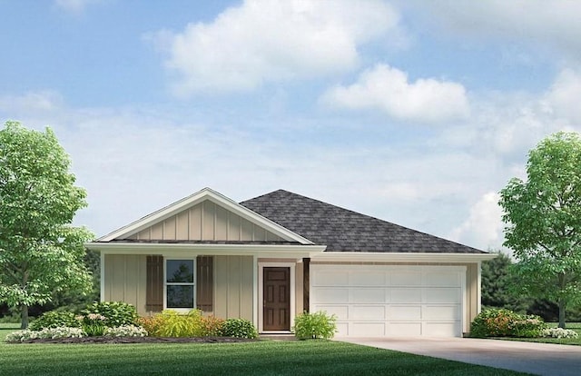 view of front of property with a garage and a front yard