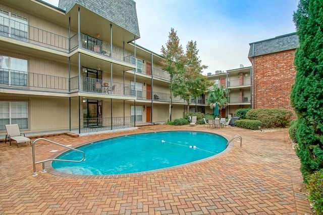 view of pool with a patio