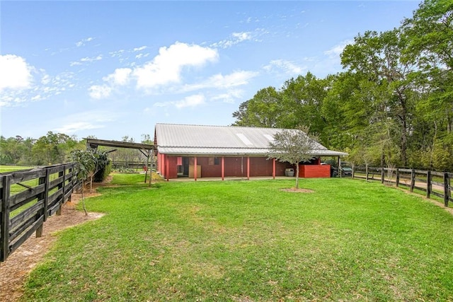 17120 Kat Kaw Rd, Franklinton, LA 70438 - rear view of property with metal roof, an outdoor structure, and an exterior structure