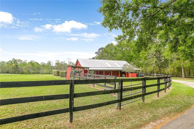 17120 Kat Kaw Rd, Franklinton, LA 70438 - view of gate with a rural view, an outbuilding, and an exterior structure