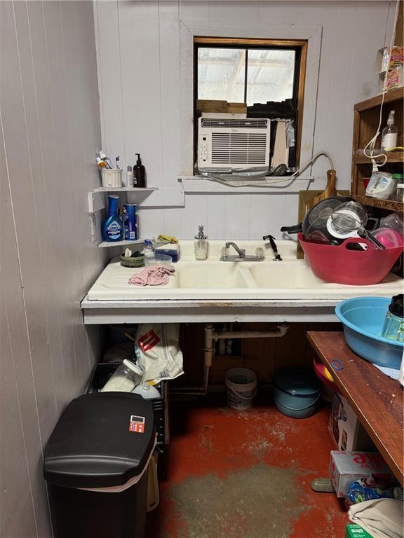 17120 Kat Kaw Rd, Franklinton, LA 70438 - bathroom with cooling unit and concrete floors