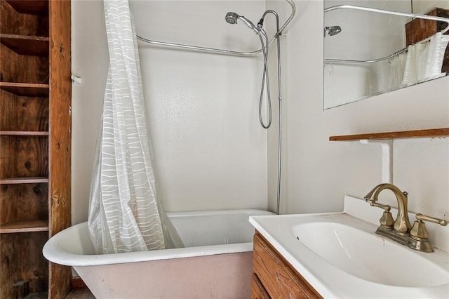 bathroom featuring vanity and shower / bath combo