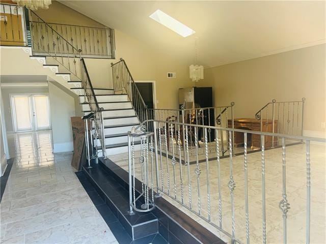 7110 Camberley Dr, New Orleans, LA 70128 - staircase featuring a skylight and baseboards