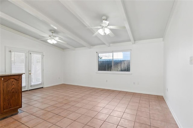 unfurnished room featuring a healthy amount of sunlight, light tile patterned floors, and ceiling fan