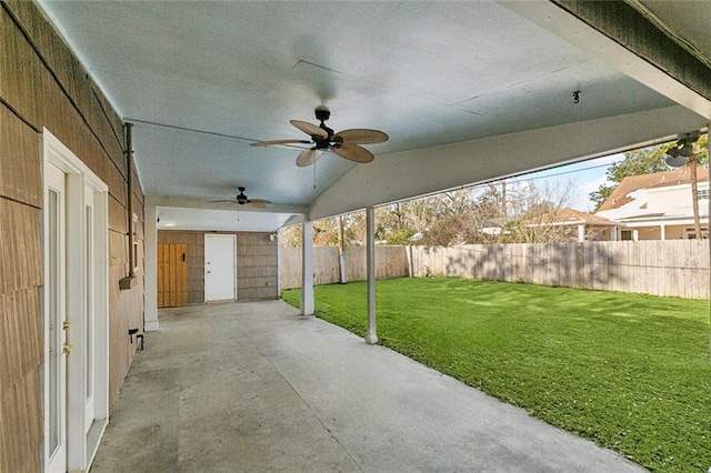 view of patio featuring ceiling fan