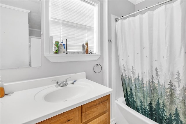 bathroom with vanity and shower / bathtub combination with curtain