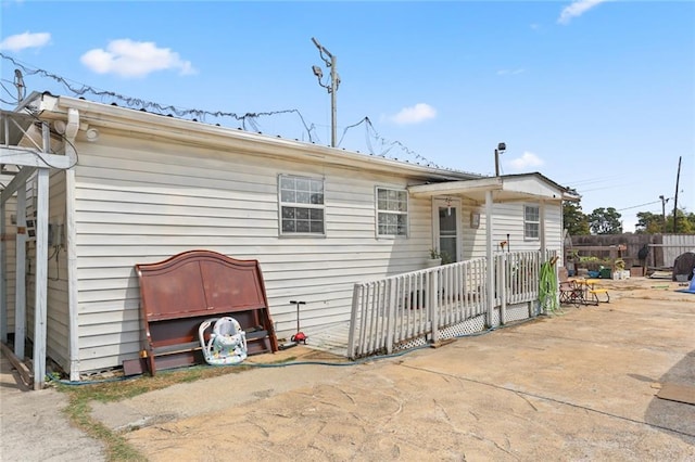 view of front of home with a patio area