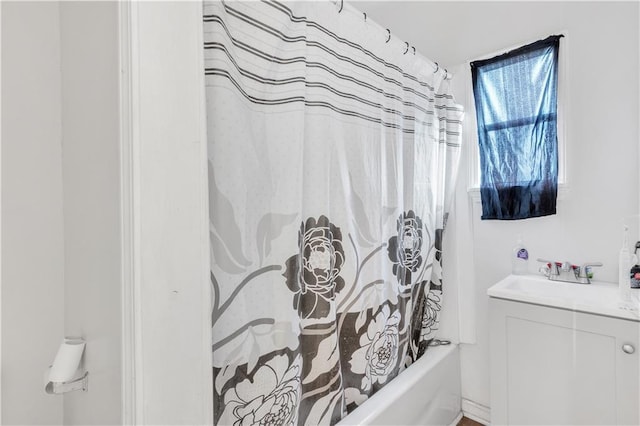 bathroom with vanity and shower / bathtub combination with curtain