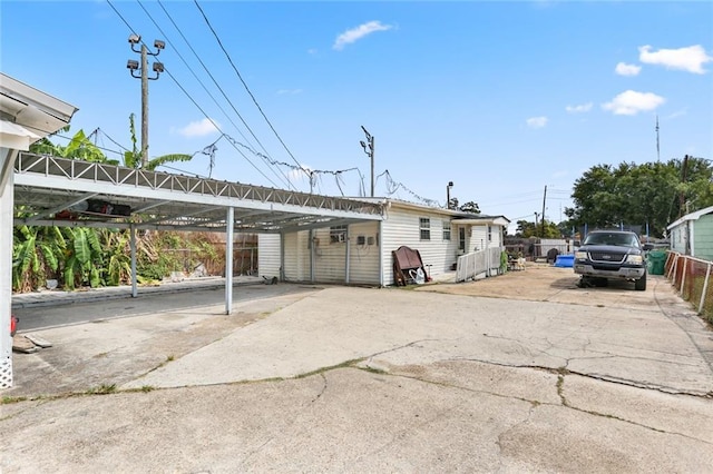 view of parking featuring a carport