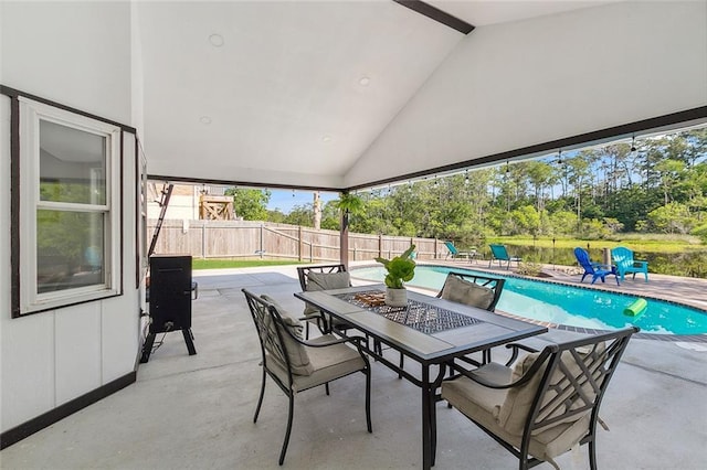 view of patio featuring a fenced in pool