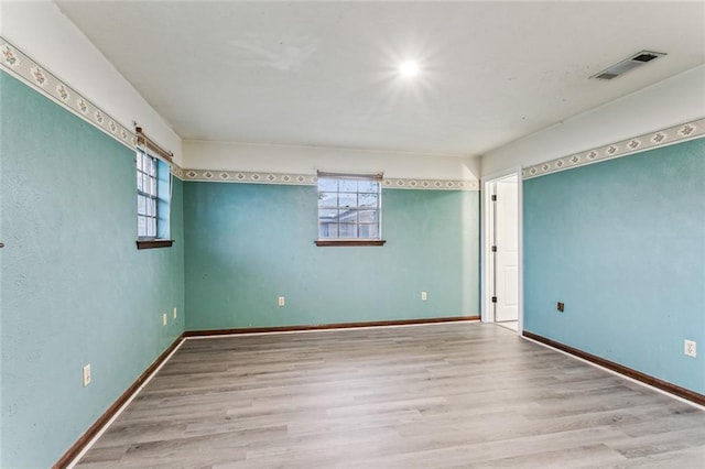 empty room featuring light hardwood / wood-style flooring