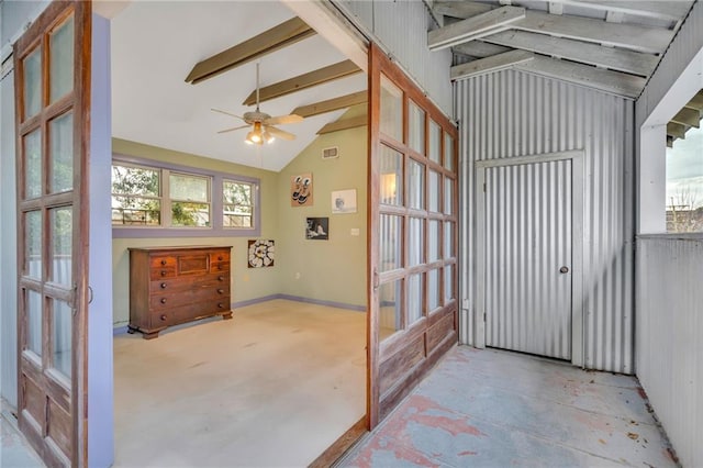 sunroom / solarium featuring lofted ceiling and ceiling fan