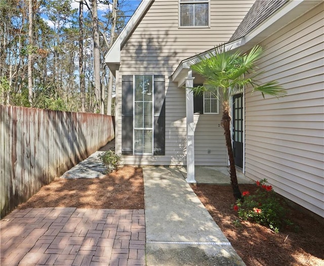 626 S Village Ln Unit A, Mandeville, LA 70471 - view of exterior entry featuring a patio area