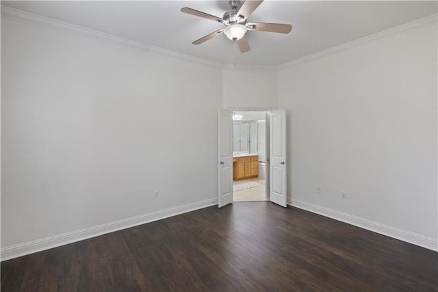 empty room featuring dark wood-type flooring, ornamental molding, and ceiling fan