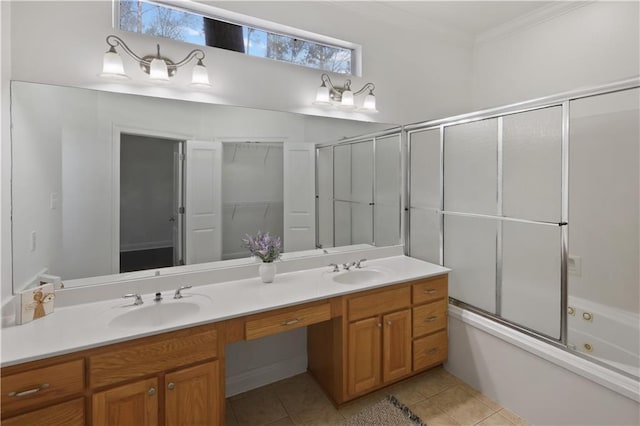 bathroom with enclosed tub / shower combo, ornamental molding, tile patterned floors, and vanity