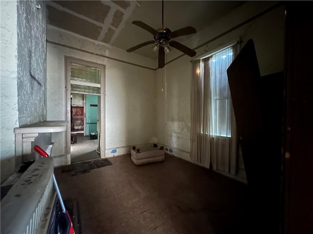 misc room with ceiling fan