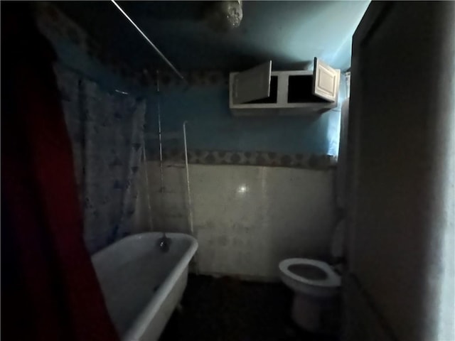 bathroom featuring toilet