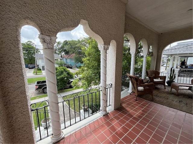 view of patio / terrace with a balcony