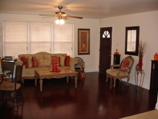 living room featuring ceiling fan