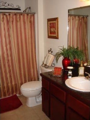 bathroom with vanity, tile patterned floors, and toilet